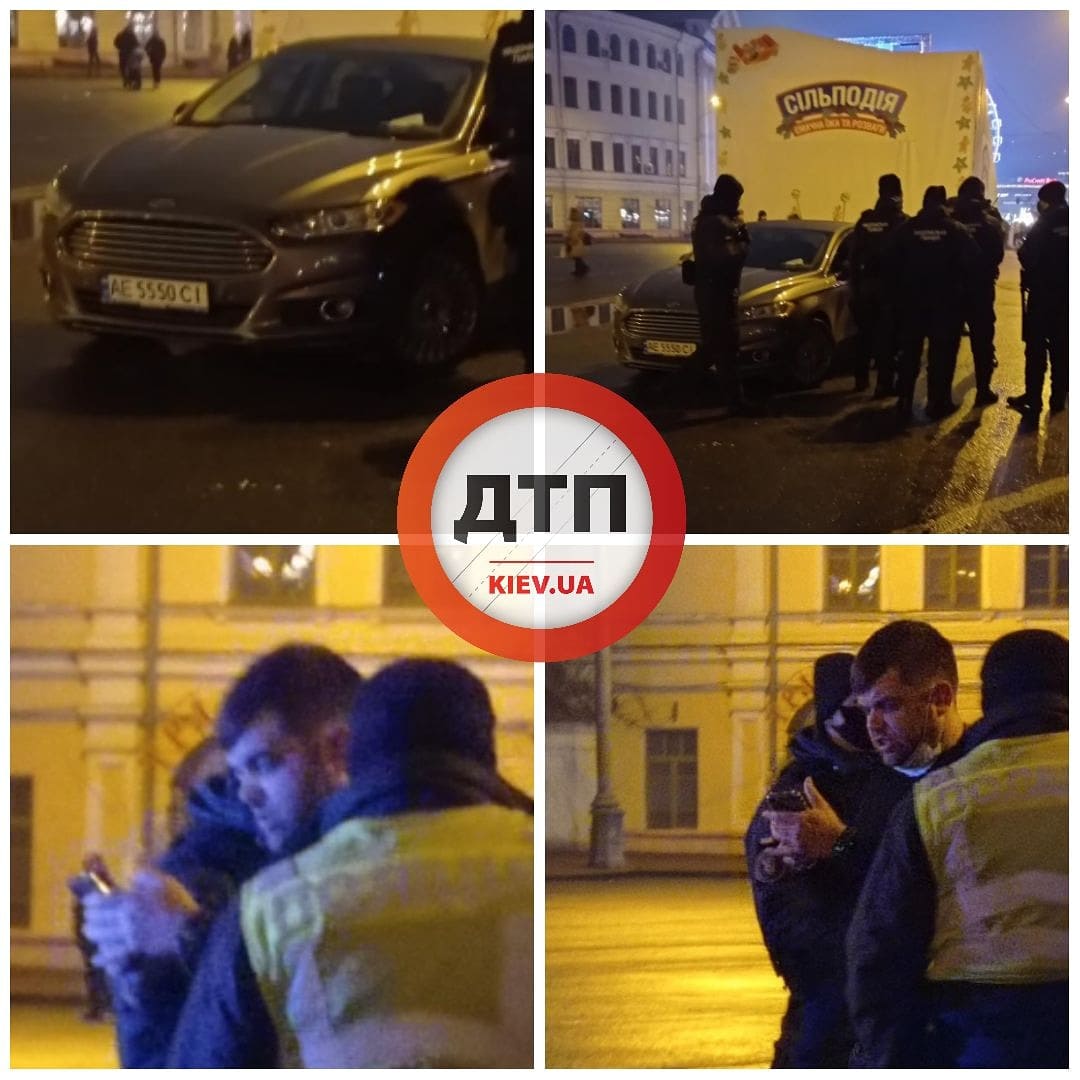 В Киеве на контрактовой площади бдительные граждане с помощью Нацгвардии остановили автомобиль Форд с пьяным водителем, который уверенно рассекал по пешеходной зоне